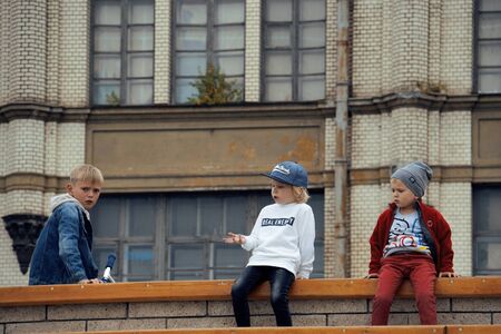 NIZHNY NOVGOROD, RUSSIA - AUGUST 09, 2019: three boys are discussing something very important.のeditorial素材