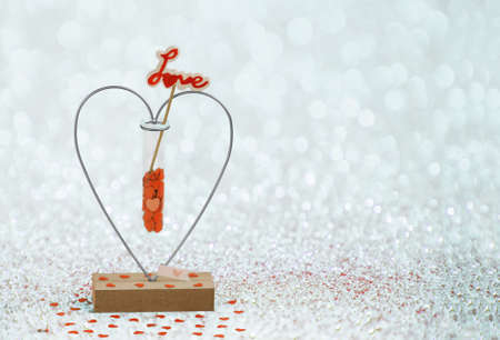 Creative vase with of a lot of red little paper hearts inside. Valentine concept of loves birth.の写真素材