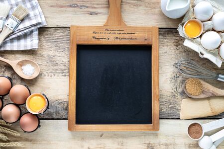 Recipe for baking chocolate Tiny pancake cereal on a wooden background, ingredients for sweet...