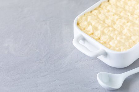Tiramisu, traditional italian dessert on a white background. Copy space.