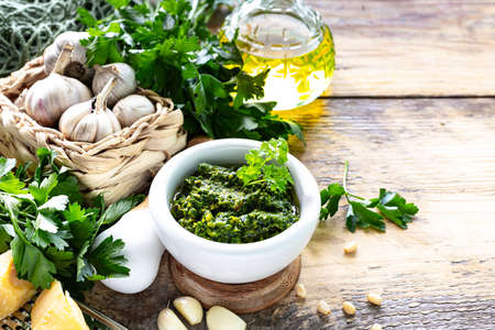 Parsley pesto sauce and ingredients for cooking. Copy spaceの写真素材