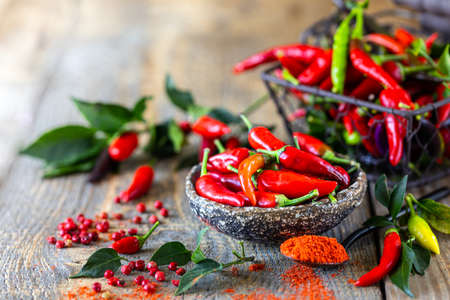 Red hot peppers as an ingredient in a vegetarian harissa snack. Traditional homemade adjika of Tunisian and Arabic cuisine. Copy spaceの写真素材