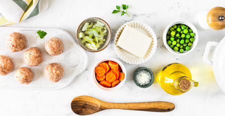 Ingredients for soup with meatballs and vegetables. Food background.の写真素材