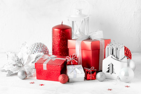 Christmas composition with red and white gifts on white background, copy spaceの写真素材