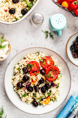 Greek vegetable casserole with rice, tomatoes and feta cheese. Top View