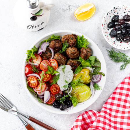 Greek meatballs with tzatziki sauce.の写真素材