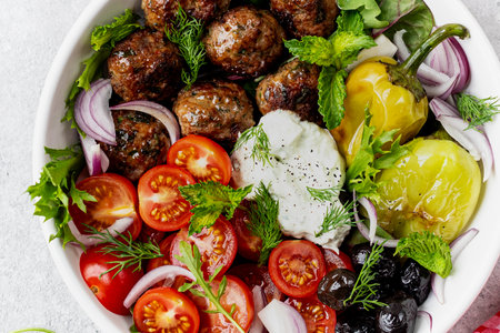 Greek meatballs with tzatziki sauce.の写真素材