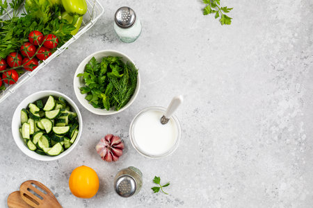 Ingredients for cooking Greek meatballs with salad and tzatziki sauce.の写真素材