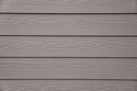 Texture of gray wooden wall. Close-up. Abstract background.