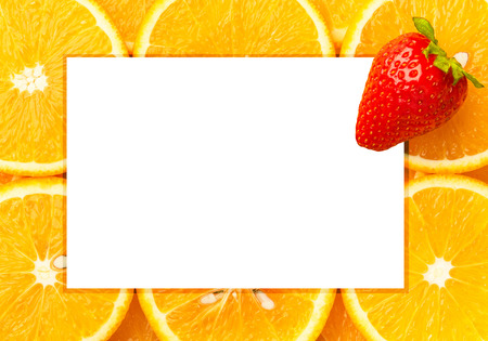 Fresh orange slices with strawberry, frameの写真素材