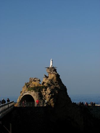 view of the emblematic Rocher de la Vierge in Biarritz, with the statue of Madonna overlooking the seaの写真素材