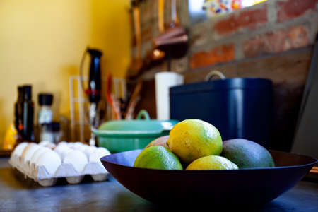 Lemons on the counter in country kitchenの写真素材