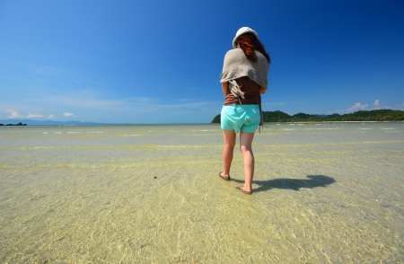 Girl Relaxing on Beachの写真素材