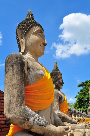 Ancient Ruin Stone Buddha Statue in Ayutthaya Province, Thailandの写真素材