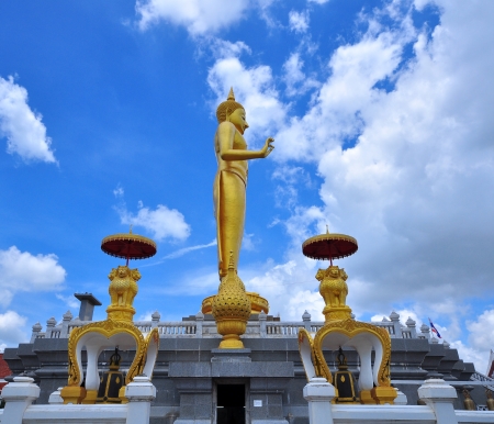 Golden Standing Buddha Statue in Songkhla Province, Thailandの写真素材