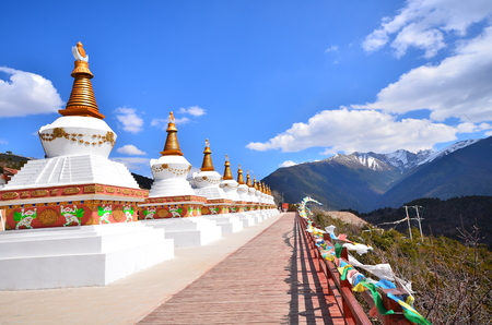Tibet Temple with Snow Mountainの写真素材
