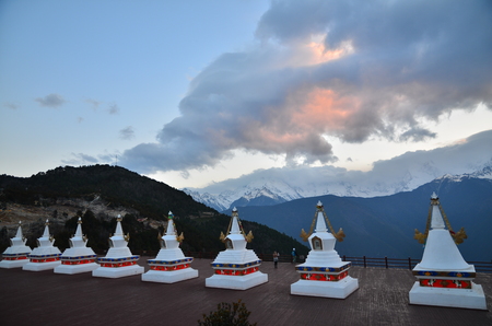 Tibet Temple on Snow Mountainの写真素材