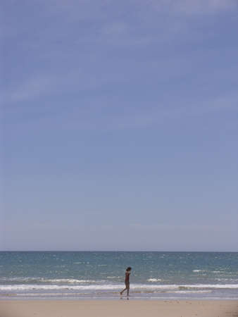 beautiful woman on the background of the beach の写真素材