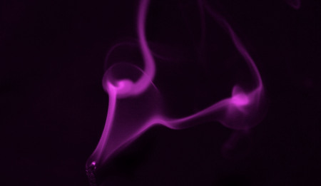 Pink Smoke with black backgroundの写真素材