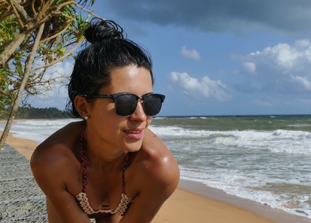 close-up portrait of a woman on the beachの写真素材
