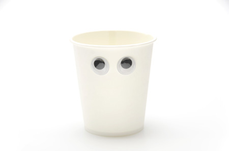 paper cup, eyeball, look around restlesslyの写真素材