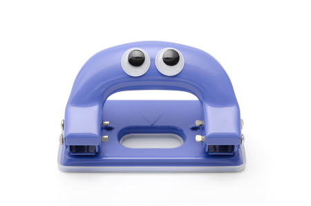 hole puncher, eyeball, look around restlesslyの写真素材