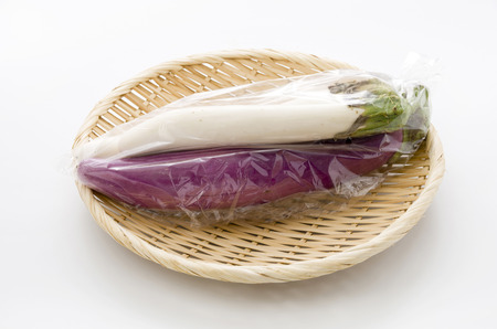 Long thin white eggplant and Long thin Purple eggplantの写真素材
