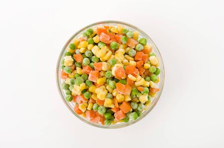 frozen mixed vegetable in Stacking bowl on white backgroundの写真素材