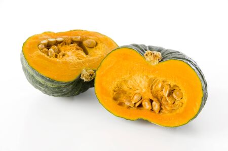 Half of the green pumpkin on white backgroundの写真素材