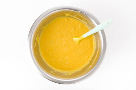 Mixing dough for pumpkin pancake.