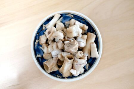 Cooked pork bones leg, leftover food.の写真素材