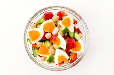 salad of chickpeas with vegetables and boiled egg