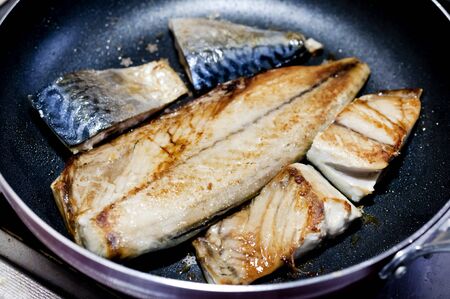 mackerel fish fried in panの写真素材