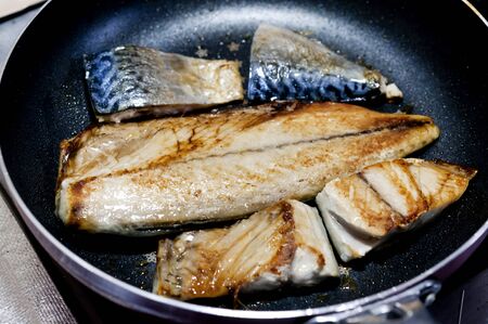 mackerel fish fried in panの写真素材