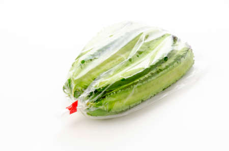 Fresh Winged beans  in plastic bag on white backgroundの写真素材