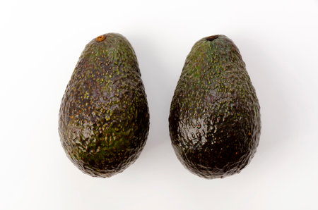 Brown avocado on white backgroundの写真素材
