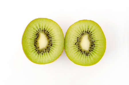 Kiwi fruit slices on white background