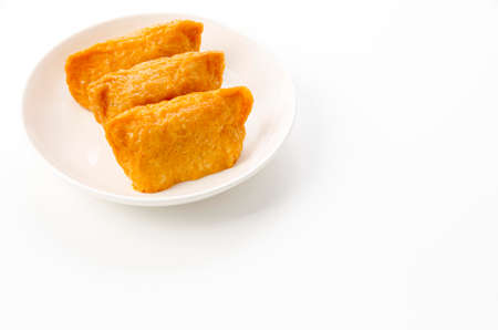 Japanese cuisine, Inari sushi, vinegared boiled rice wrapped in fried tofuの写真素材