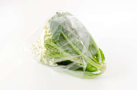 Stick type cauliflower "Califlore"  in plastic bag on white backgroundの写真素材