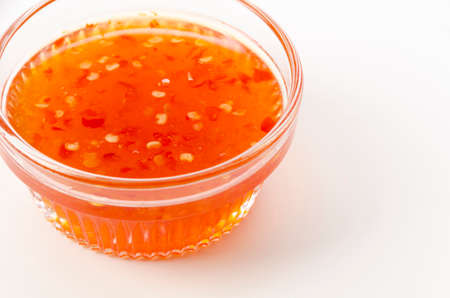 Sweet chili sauce on white backgroundの写真素材
