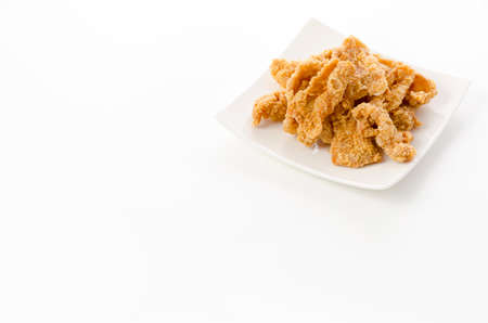 Crispy Fried Chicken Skin on plateの写真素材