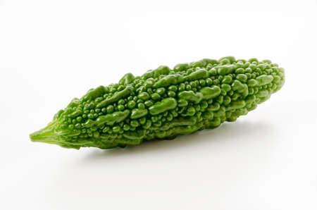 Fresh Goya, bitter gourd on white backgroundの写真素材