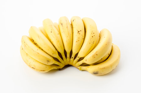 Bunch of yellow bananas on white backgroundの写真素材