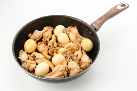 Chicken drummette and eggs simmered in sweet and spicy soy sauce.の写真素材