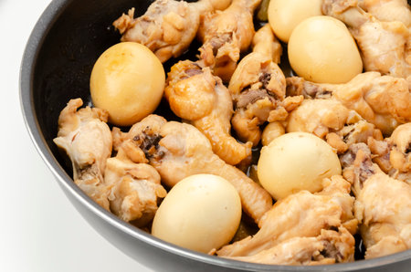 Chicken drummette and eggs simmered in sweet and spicy soy sauce.の写真素材