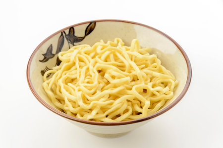 Okinawa soba noodles in a bowl on a white background.の写真素材