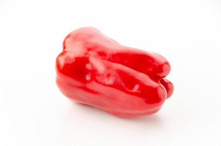 fresh red bell pepper on white backgroundの写真素材