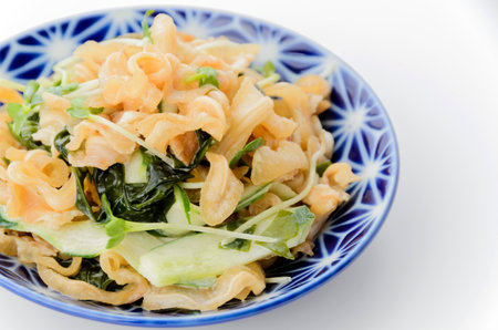 Squid and mozuku seaweed with plum vinegarの写真素材