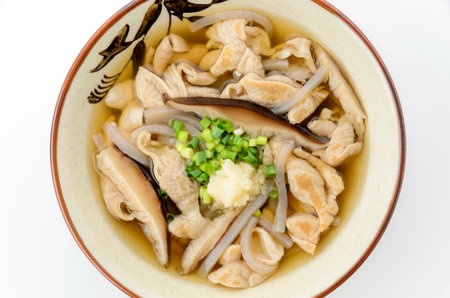 Japanese miso soup with tofu in bowl on white backgroundの写真素材