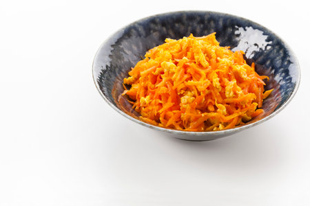 "Ninjin Shirishiri" (stir-fried shreds carrots with egg), local cuisine of Okinawa prefecture, Japan.の写真素材